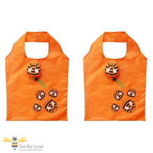 Load image into Gallery viewer, Two orange foldable shopping bags with bee designs and carry pouch.