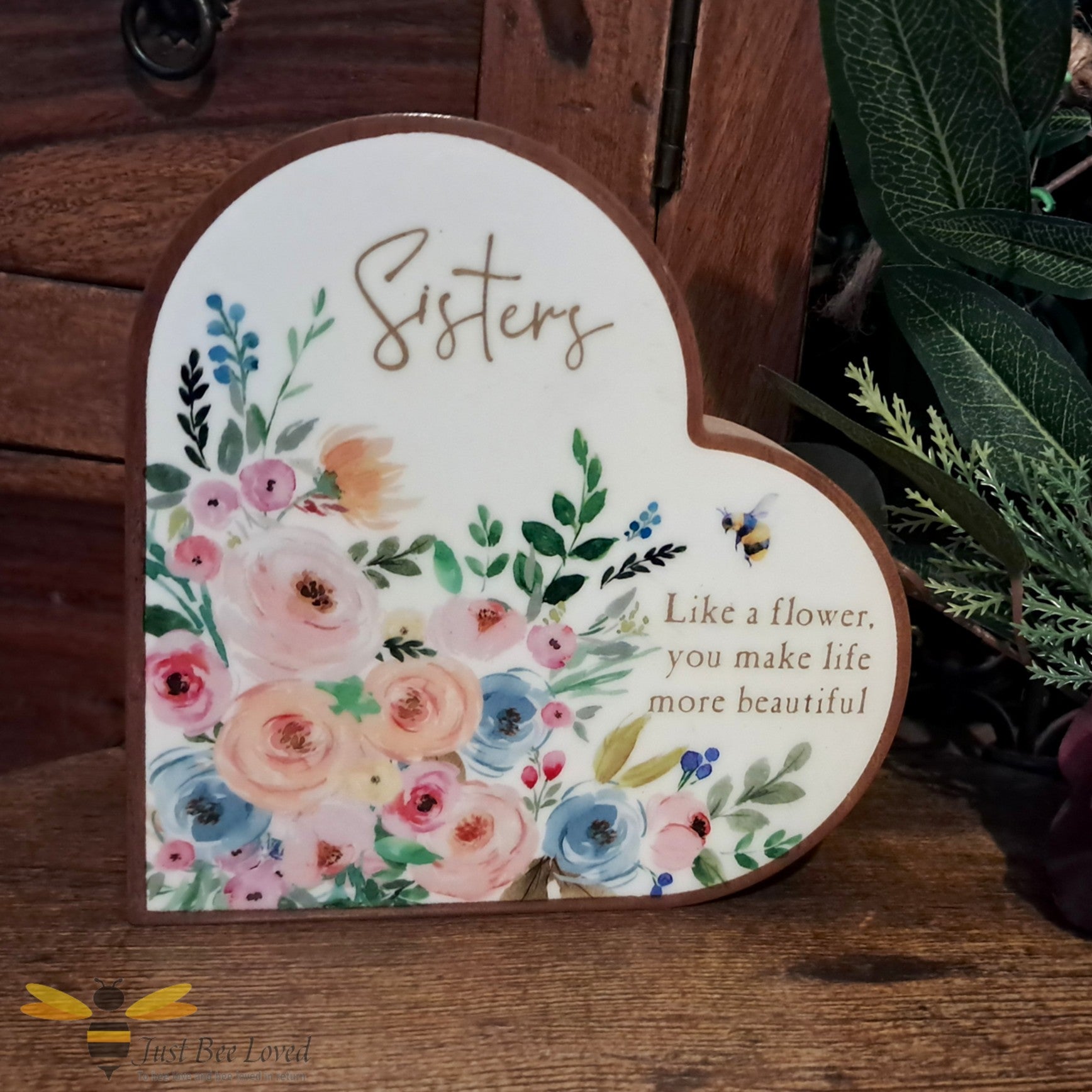 Heart-shaped decorative freestanding plaque for a sister with a bee and florals and message 'like a flower you make like more beautiful'