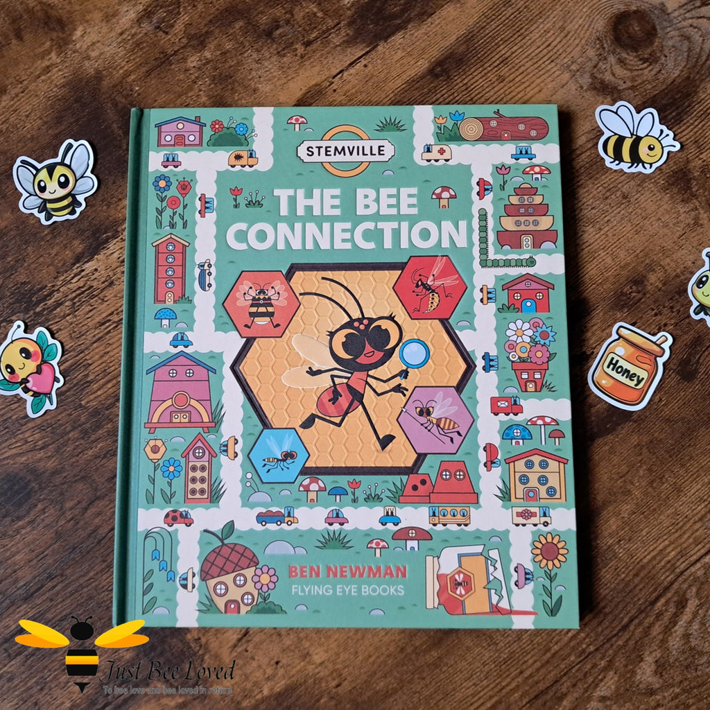 Children's book titled 'The Bee Connection' with bee-themed stickers.