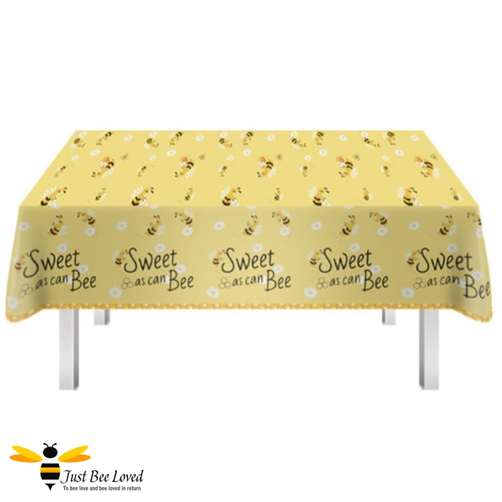 Bee themed plastic party table cover with "sweet as can bee" text