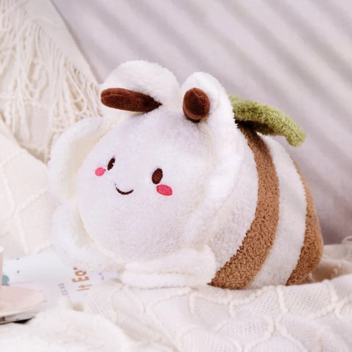 White bumble bee soft toy with daisy flower face