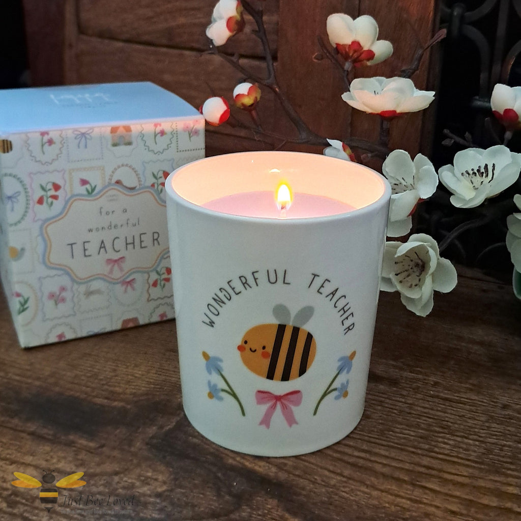 Ceramic container candle with 'Wonderful Teacher' text, cartoon bee and flowers illustration with matching gift box.