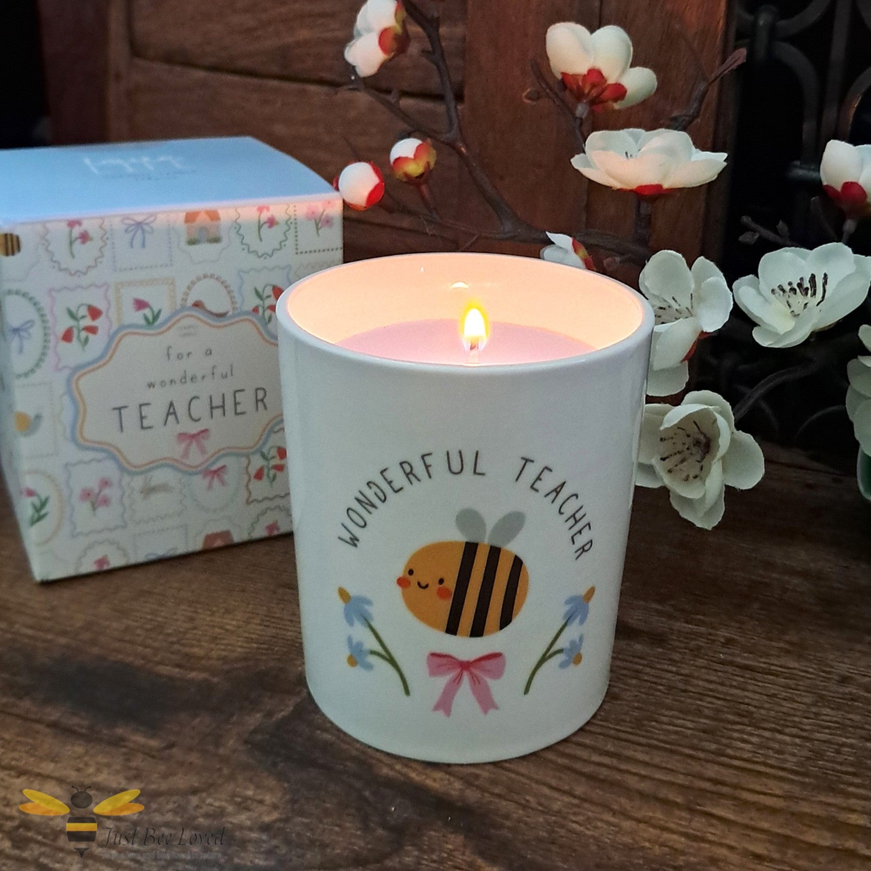 Ceramic container candle with 'Wonderful Teacher' text, cartoon bee and flowers illustration with matching gift box.