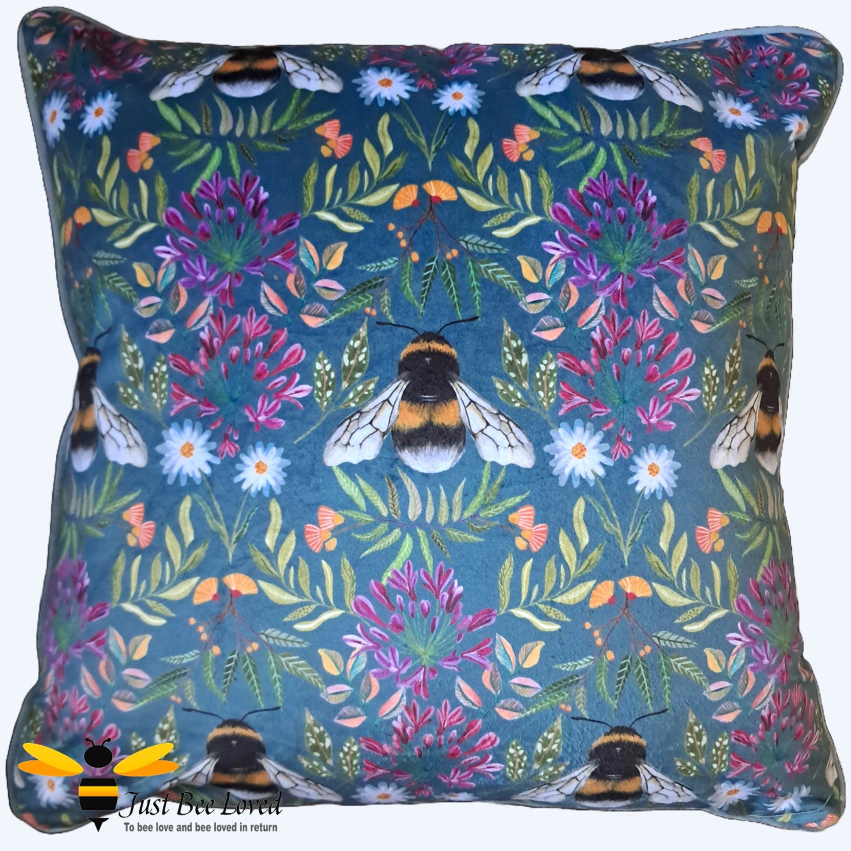 Wylder nature blue velvet bumble bee and florals cushion.