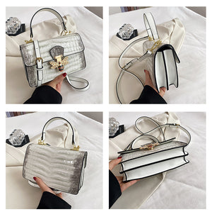 Gallery of white pu patent leather handbag with large gold bee