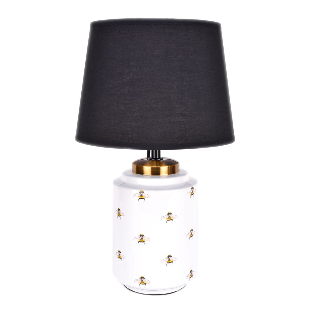 white ceramic bee table lamp with black cotton shade