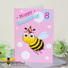 Load image into Gallery viewer, a bee themed pink birthday card featuring a cartoon illustration of a bee holding a balloon with the number 8.