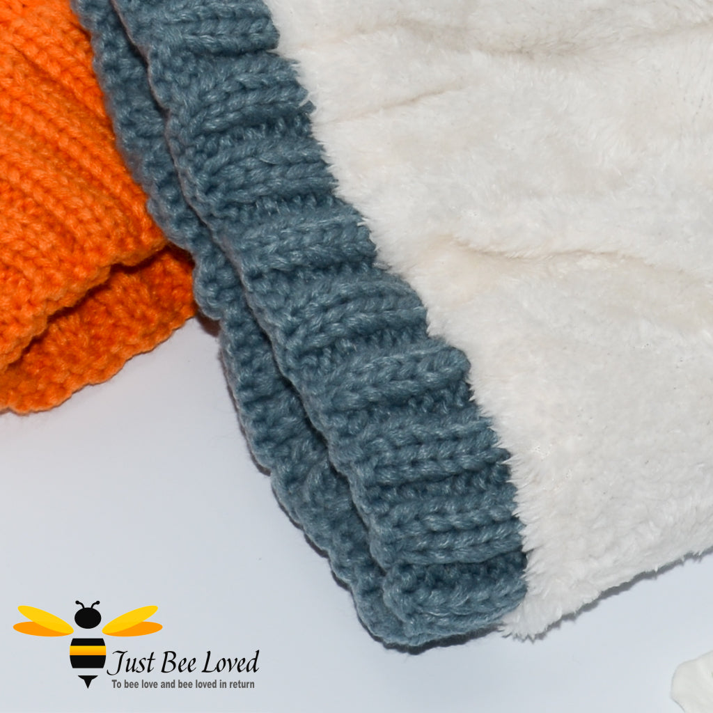 Aran style knitted hat featuring an embroidery bumblebee