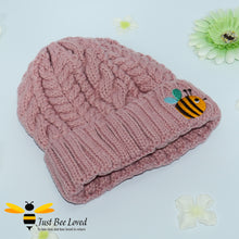 Load image into Gallery viewer, Aran style knitted hat featuring an embroidery bumblebee on front in pink colour