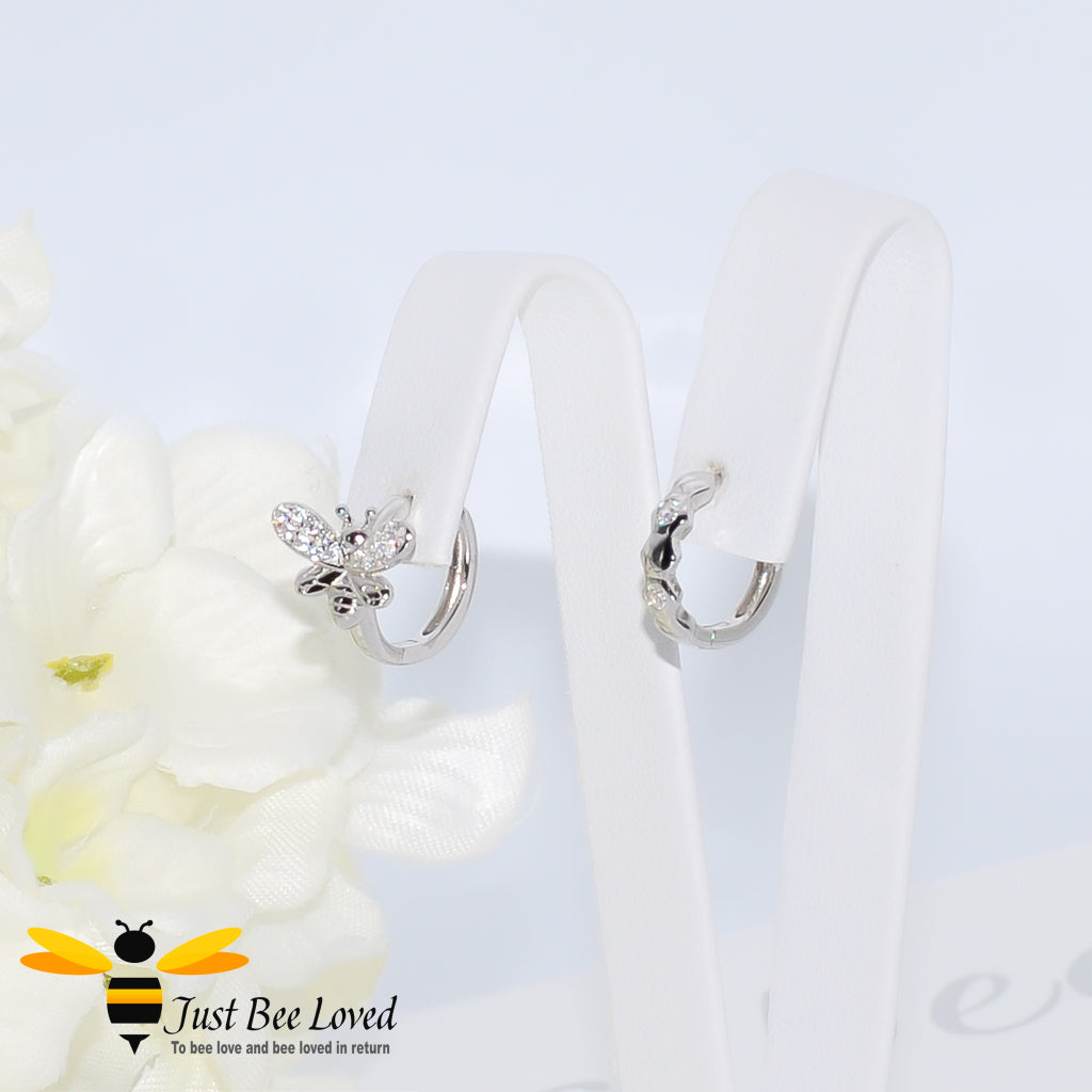 Asymmetrical bee and honeycomb sterling silver hoop earrings