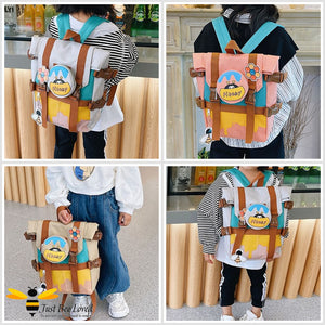 Little girl wearing a Japanese style children's honey and bee backpack school bag