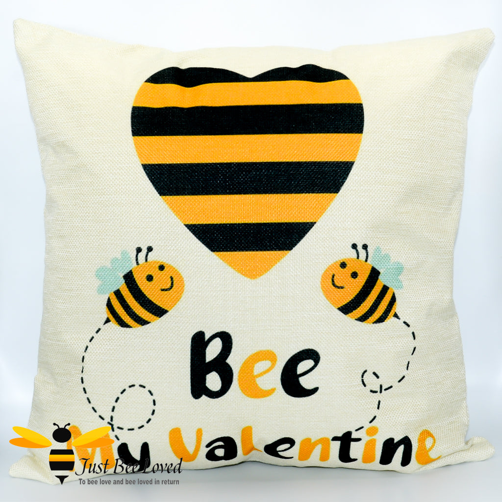 Cream scatter cushion showing two bees in love with "Bee my Valentine" calligraphy.