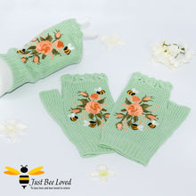 Load image into Gallery viewer, hand-embroidered bees &amp; flowers fingerless woollen mitten gloves in pastel green colour