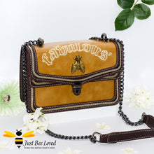 Load image into Gallery viewer, Rock chic styled vegan leather handbag featuring bold golden &quot;Fabulous&quot; embroidery with vintage gold bee embellishment in mustard colour.