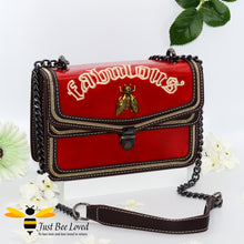 Load image into Gallery viewer, Rock chic styled vegan leather handbag featuring bold golden &quot;Fabulous&quot; embroidery with vintage gold bee embellishment in dark red colour.