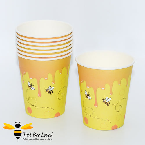 Party paper cups with bees and honey design