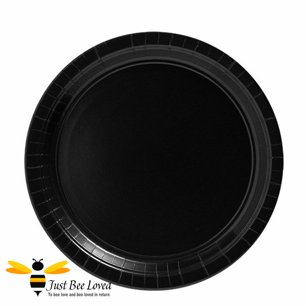 Black round disposable party plates.