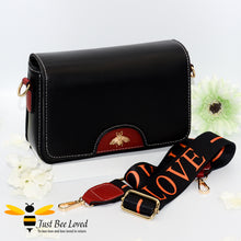 Load image into Gallery viewer, crossbody handbag in black and wine red, featuring a gold bee embellishment, wide matching canvas strap with &#39;LOVE&#39; text. 