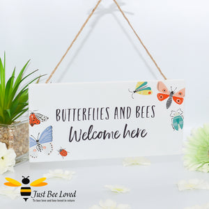 Garden hanging sign with decorative illustrations of butterflies, bees with the text "Butterflies and Bees Welcome Here".