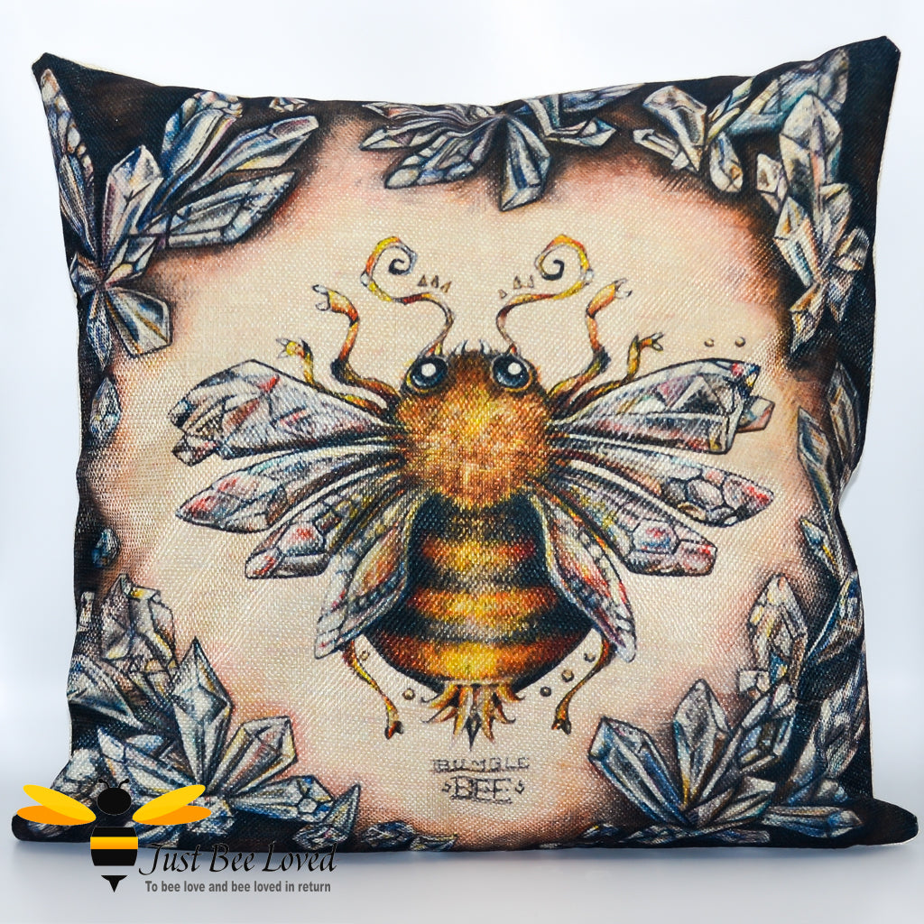 A cushion with a detailed image of a bumblebee in a floral pattern on a natural earthy style background.