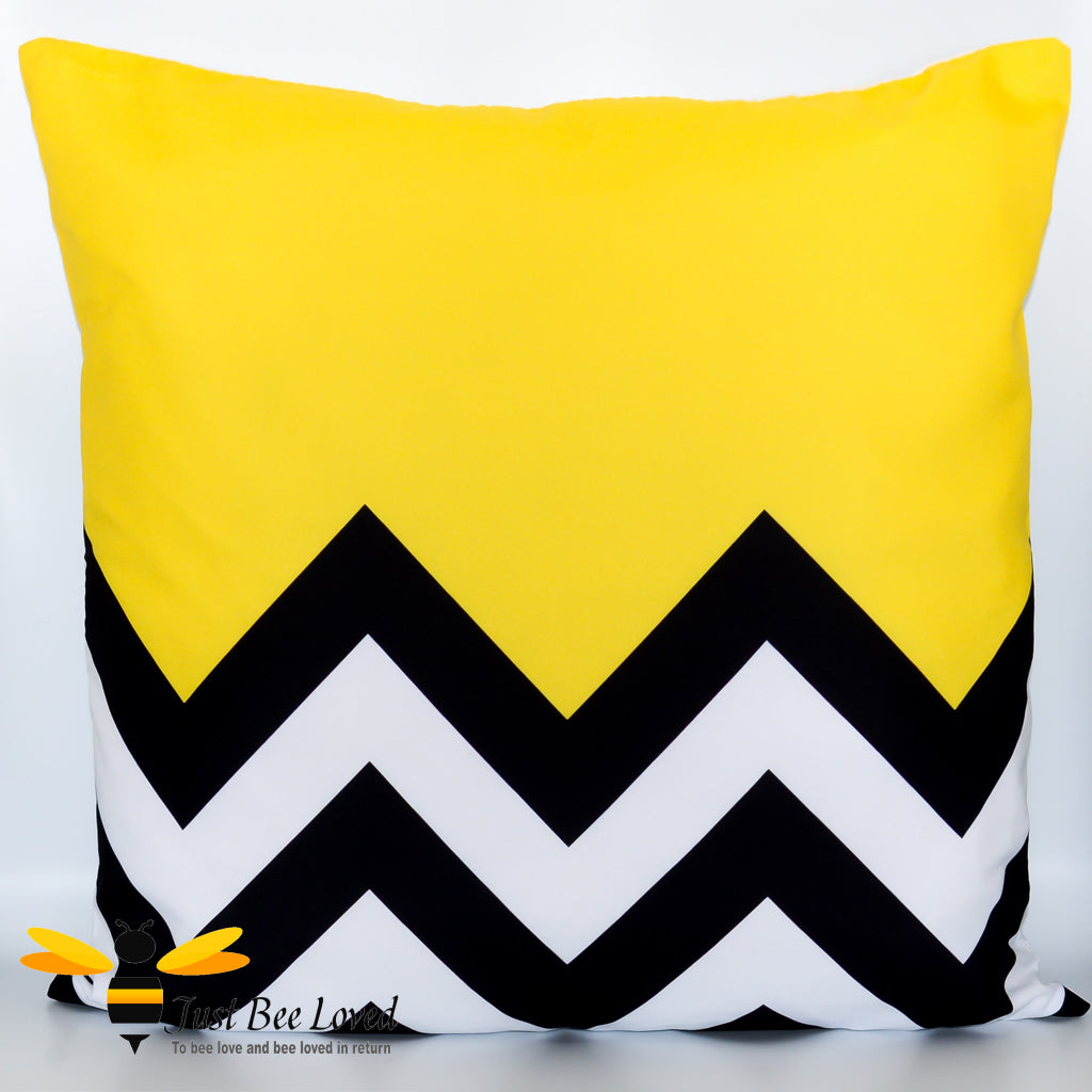 A black, yellow and white zig zag design scatter cushion.