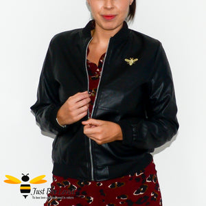 Women's faux vegan friendly PU leather black biker bomber baseball jacket featuring bee embroidery detailing