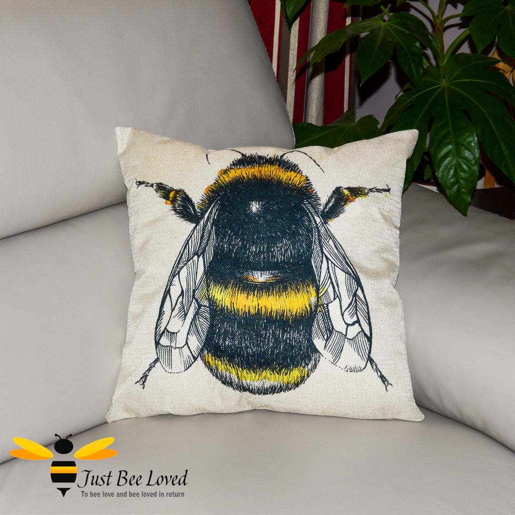 Beige linen cushion featuring a colourful sketch of a bumblebee