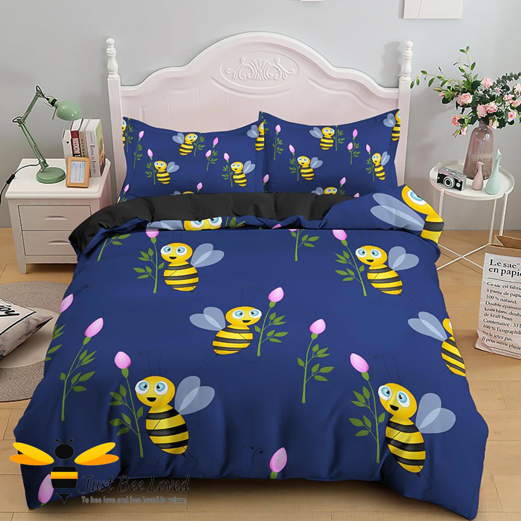 Navy duvet cover set featuring a design of cartoon bees with holding pink tulips flowers.