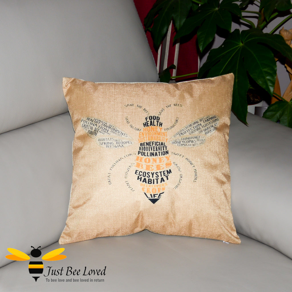 light orange scatter cushion featuring a calligram art image of a honey bee - with ecosystem and nature statements such as "save the bees, save nature".
