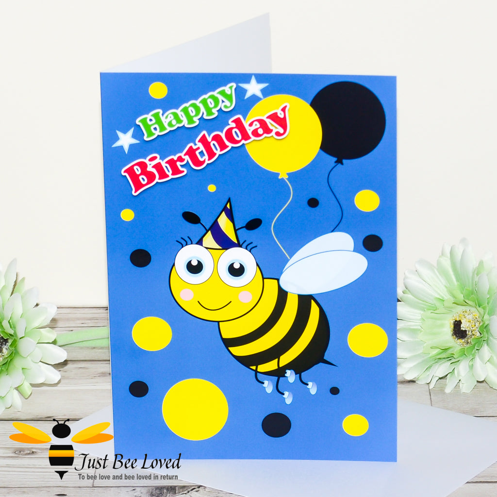 a birthday greeting bee card for young boy featuring cartoon bee with a party hat and yellow and black balloons on a blue background.