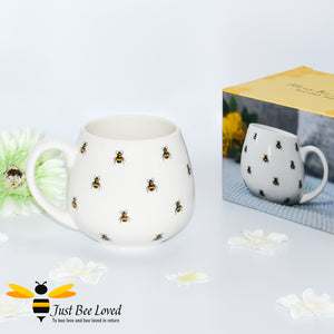 rounded mug featuring an all over print of bumblebees.