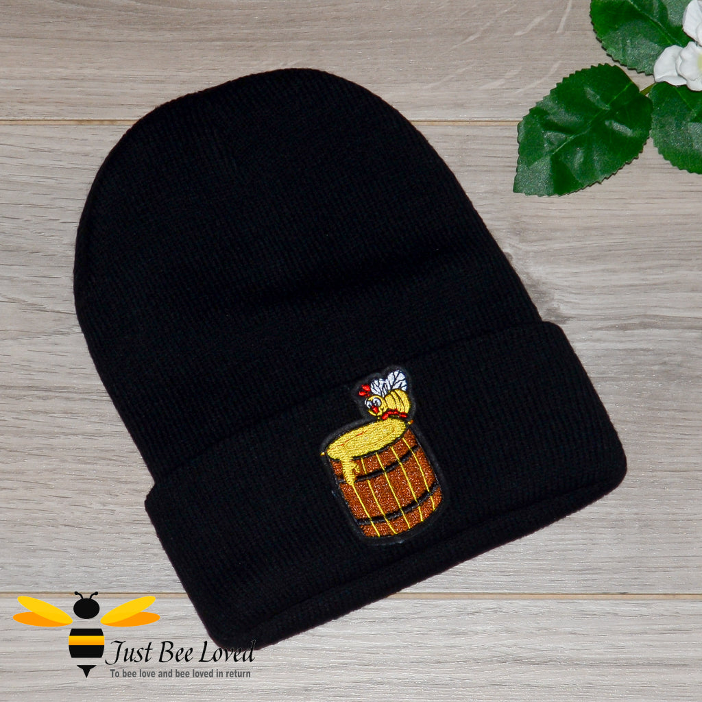 Kids black rimmed beanie hat with honey bee