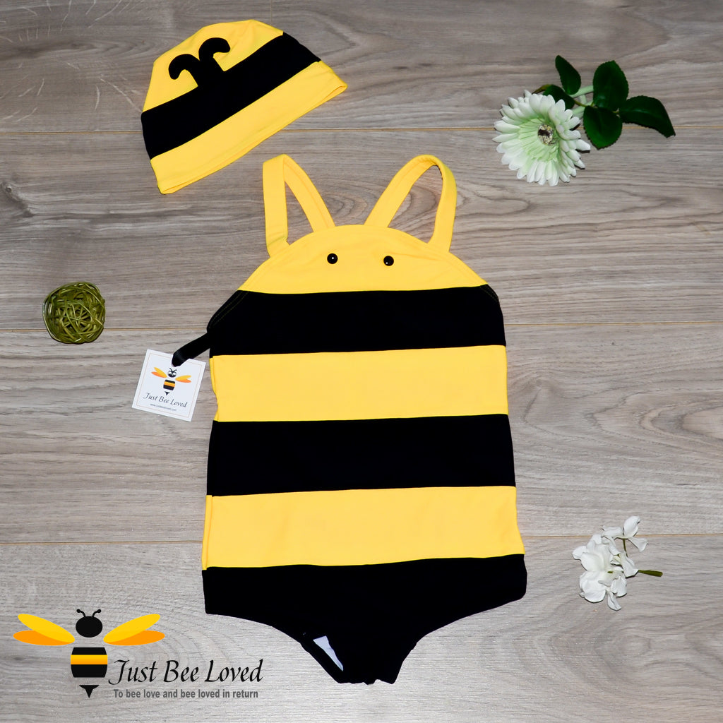  bumblebee character swimsuit set features a yellow & black striped one-piece suit with matching hat. 