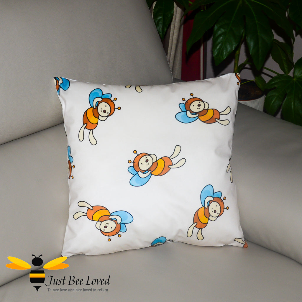 Children's cream decorative cushion featuring cartoon bees