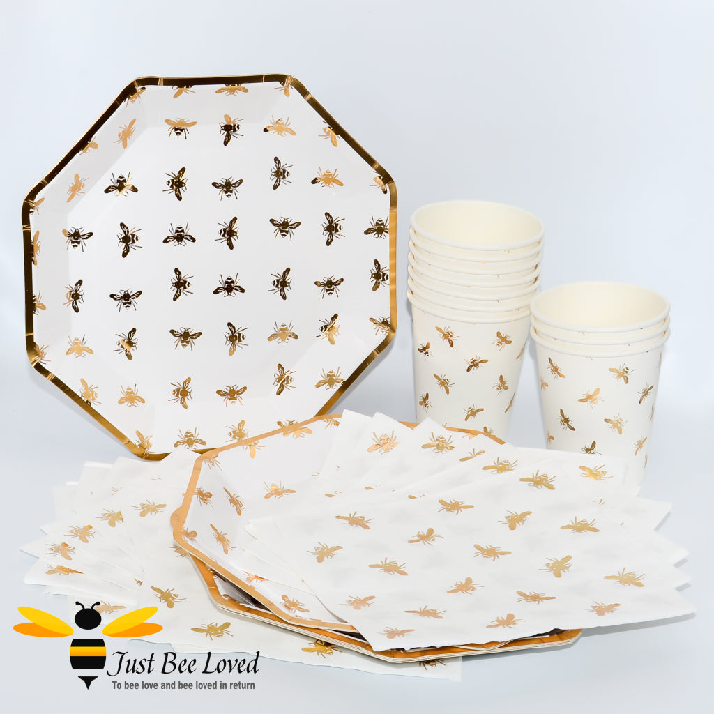 white and gold 35 piece tableware party set featuring an all over design of golden bees
