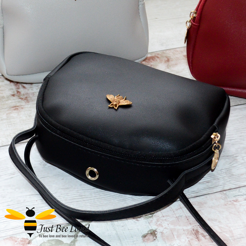 Just Bee Loved Small PU Leather cross body handbag with gold bee embellishment available in four colours, black, burgundy, grey, pink