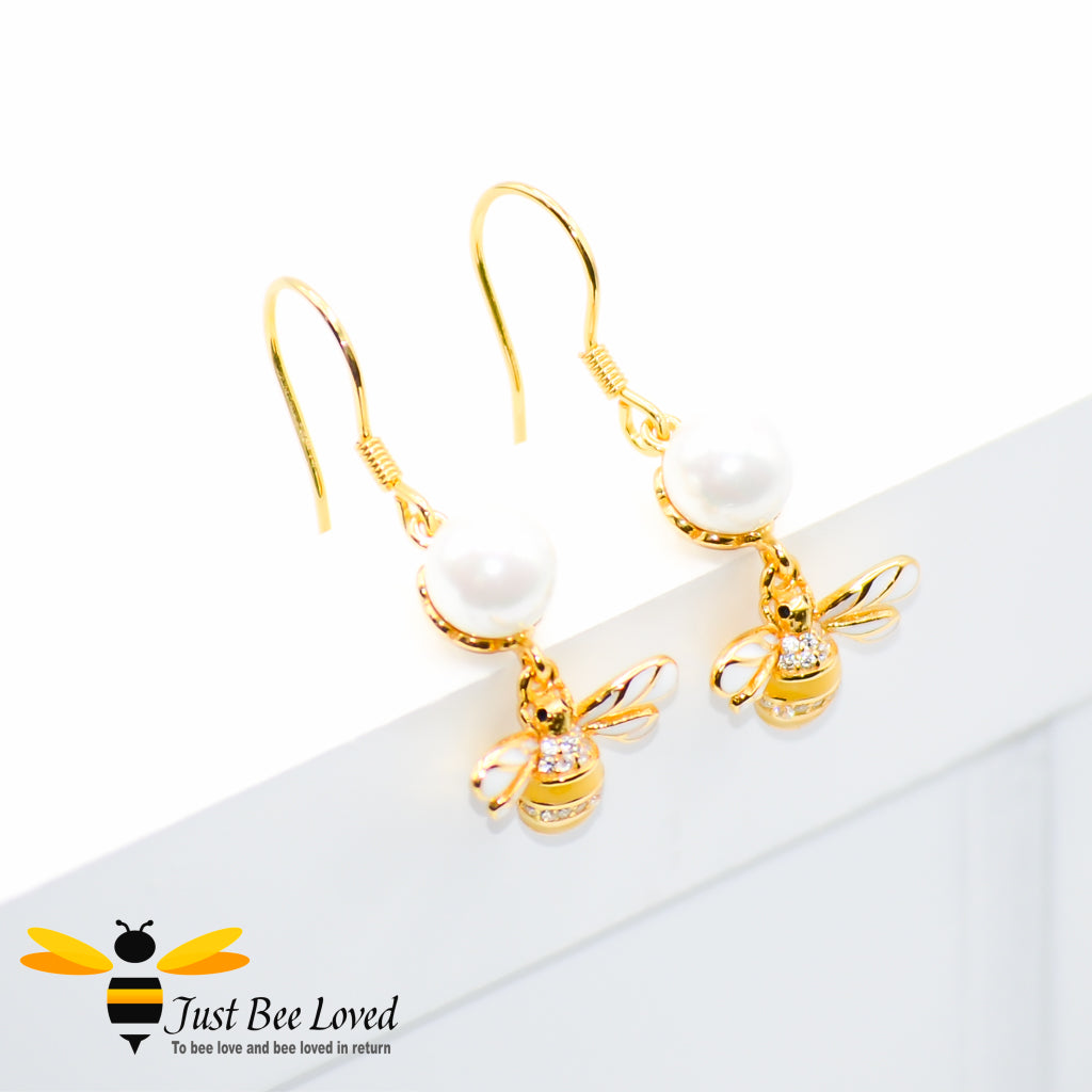 Sterling Silver 925 Freshwater Pearl and Bee drop earrings with mother of pearl wings and white zircon. Gold plated