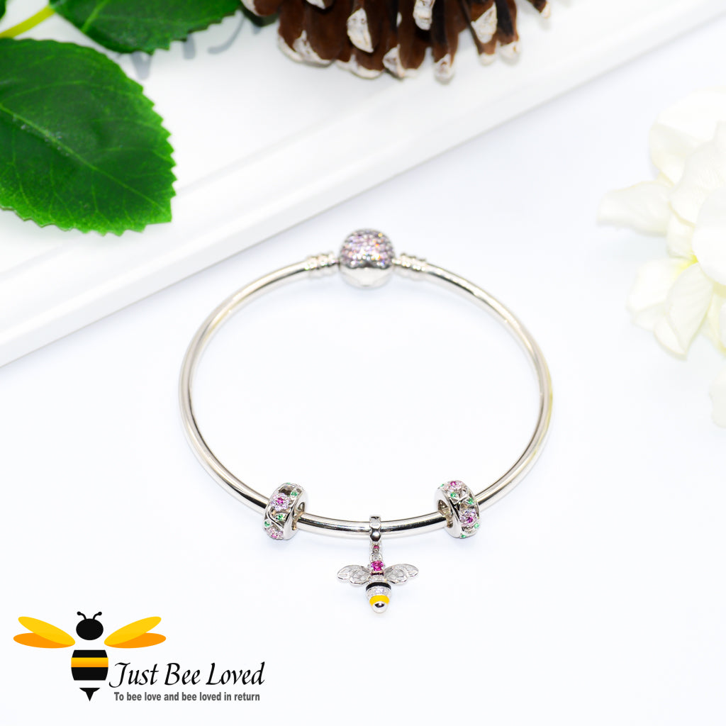 Sterling Silver 925 Bangle with two rose crystal charms and sterling silver bee charm