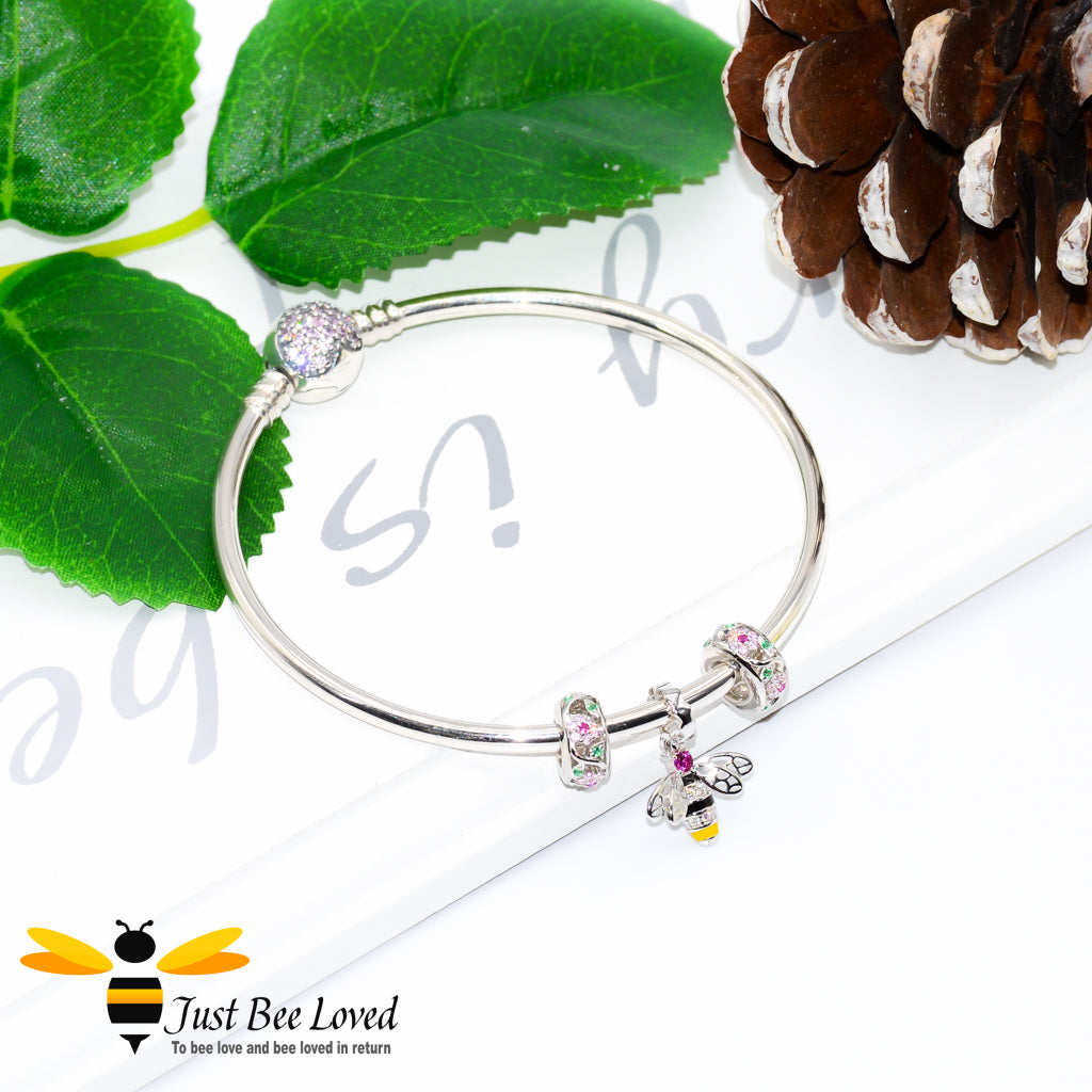 Sterling Silver 925 Bangle with two rose crystal charms and sterling silver bee charm