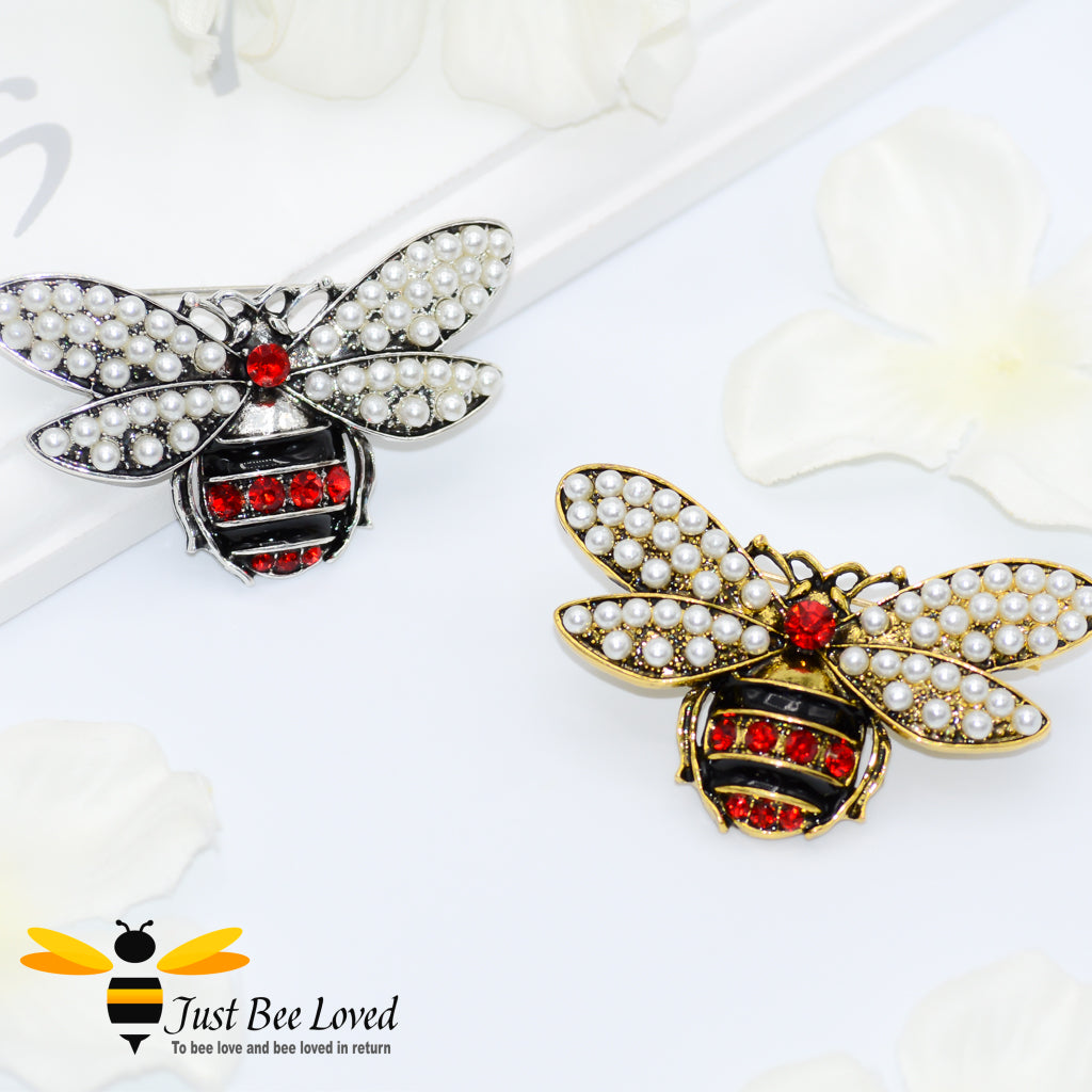 Two Pearl Bee Brooches in silver and gold