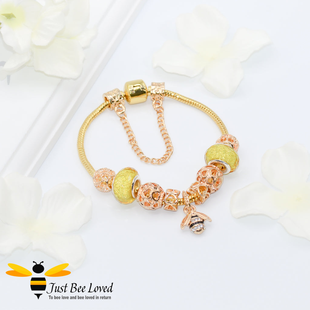 yellow Murano Beads and bee Charm gold colour Bracelet with safety chain.