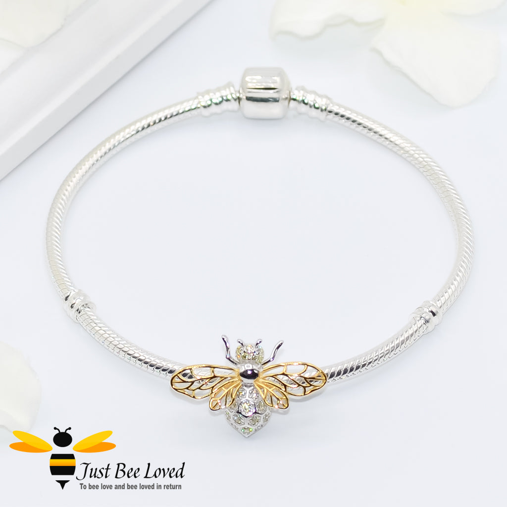 Sterling Silver 925 snake charm bracelet with sterling silver bee charm inlaid with white zircon  and gold plated wings