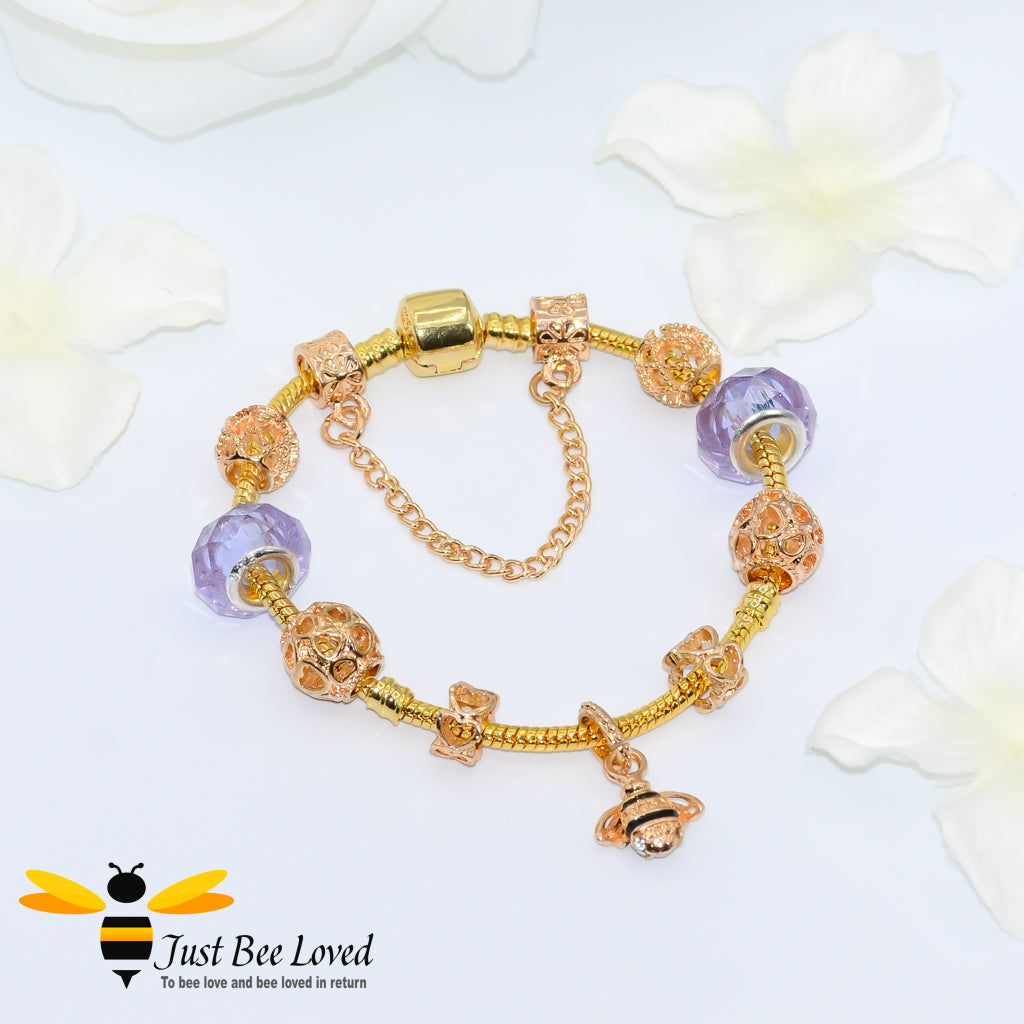 Purple Beads and bee Charm gold colour Bracelet with safety chain.