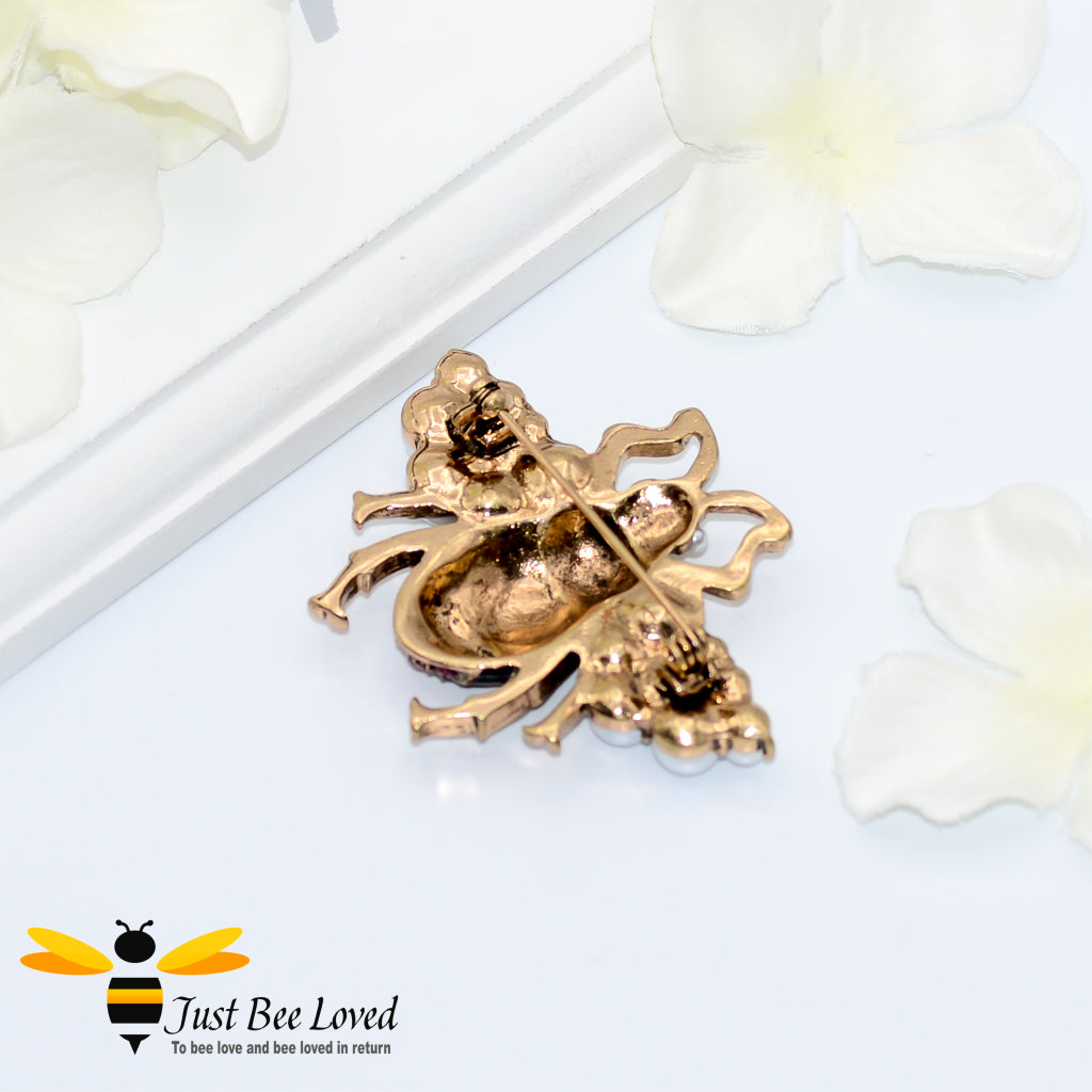 Gold colour bee brooch