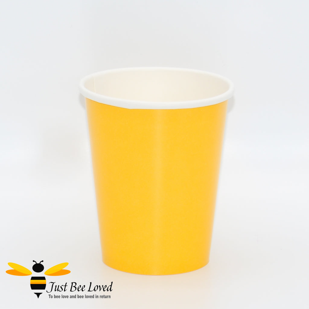 Yellow disposable paper party cups