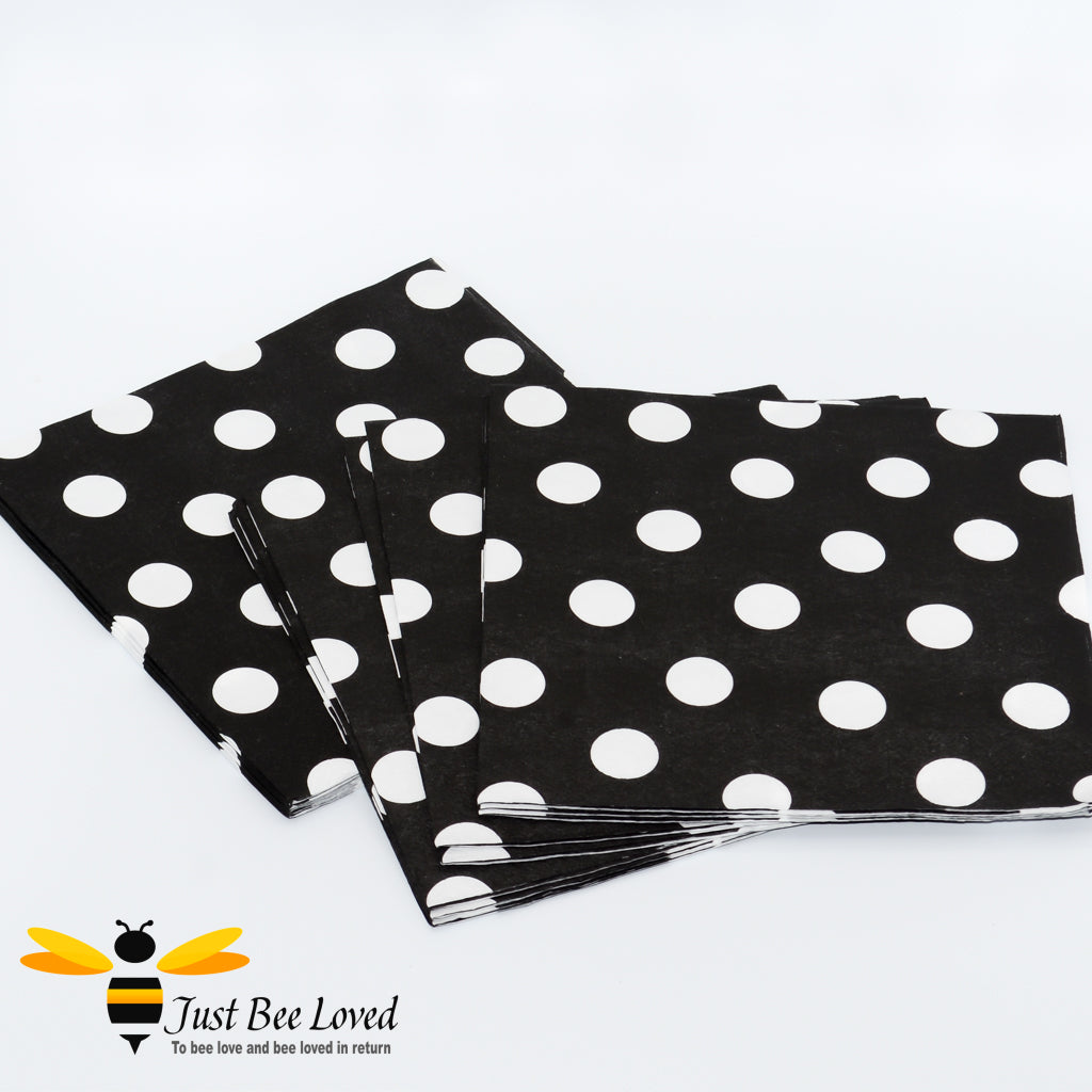 Black paper napkins with large white polka dots 