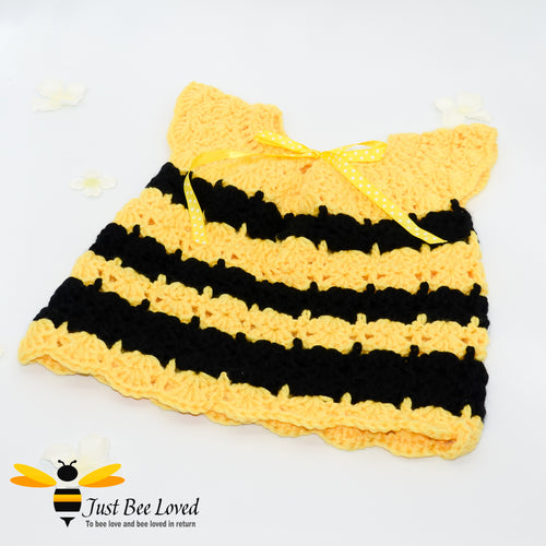 Hand crocheted smocked styled baby girl bee dress. 