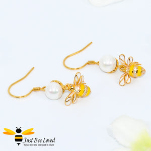Sterling Silver 925 Freshwater Pearl and Bee drop earrings with mother of pearl wings and white zircon. Gold plated