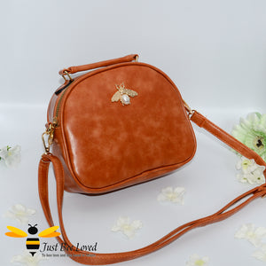 Just Bee Loved PU Leather Crossbody Handbags with gold bee and pearl embellishment in rustic orange colour