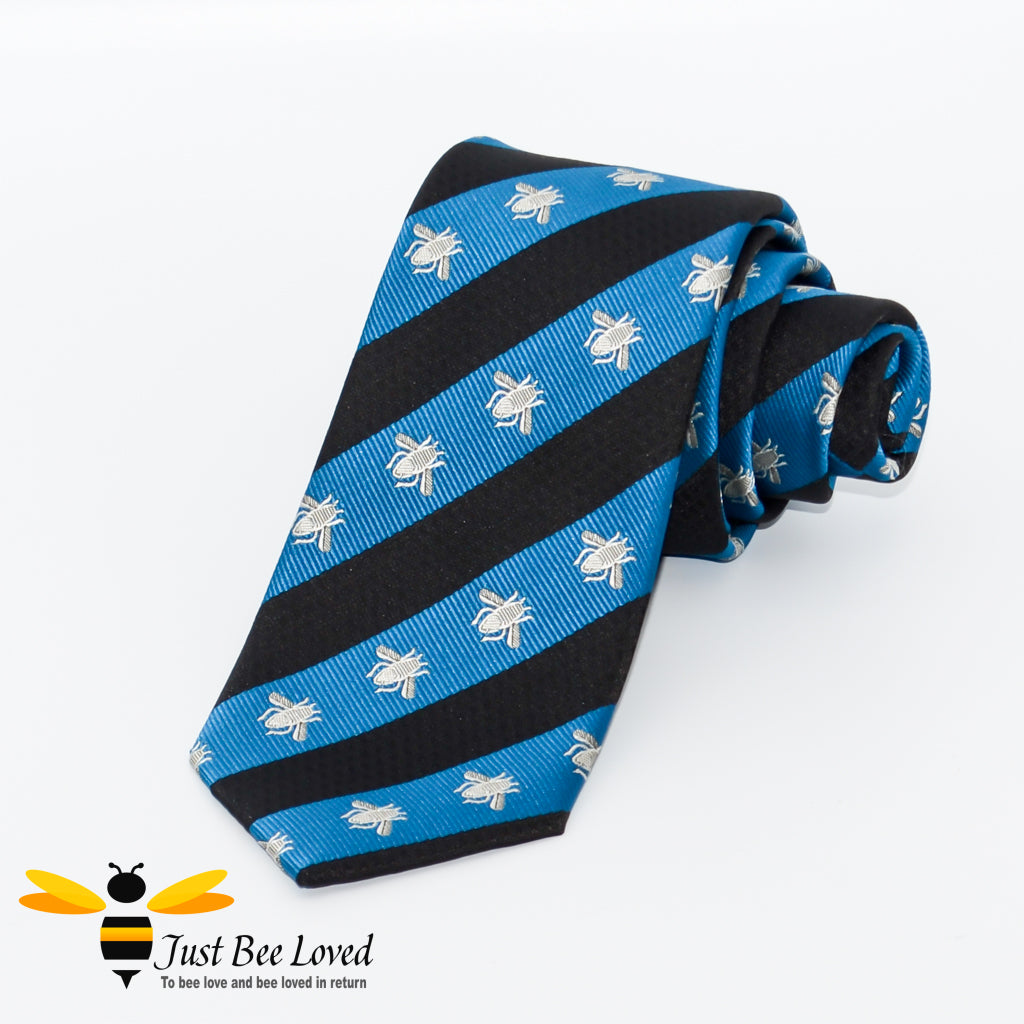 Navy and blue diagonal striped neck tie with grey embroidered bees design